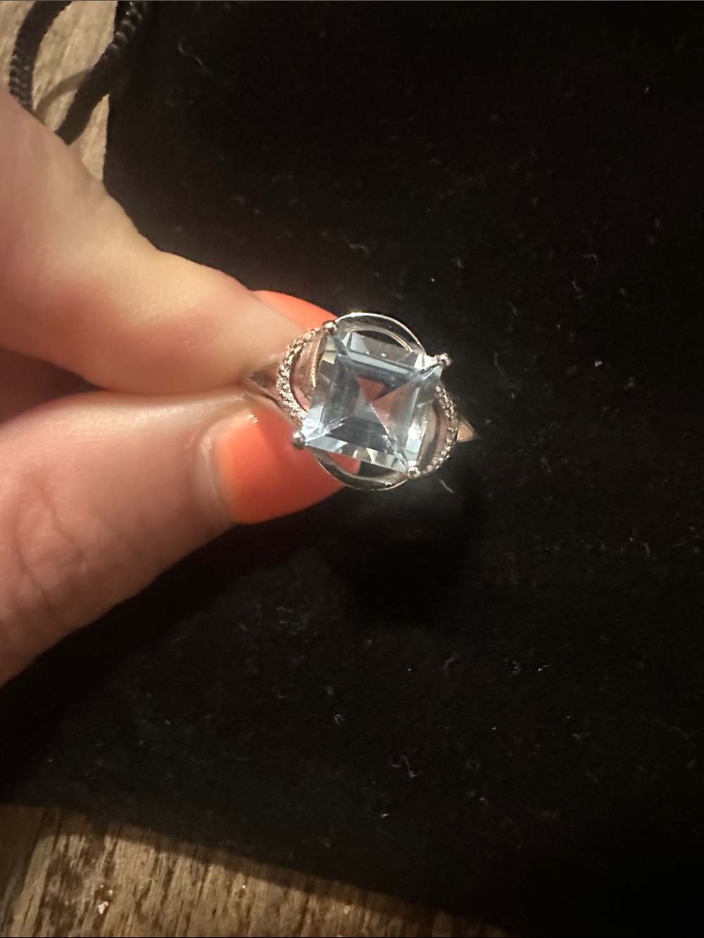 Silver Ring with Light Blue topaz and natural diamond halo